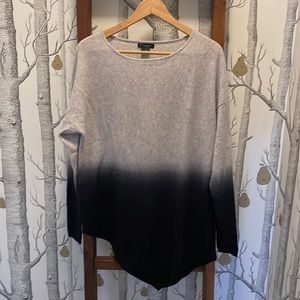 It’s a cashmiracle!  100% cashmere black/grey asymmetrical tunic.  Like new.